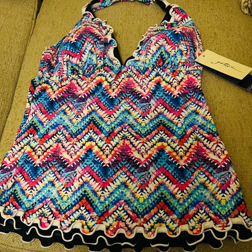 Tankini top vibrant colors- pink, turquoise, black and white. New with tags!